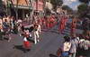Mickey leads a parade