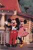 Mickey and Minnie in front of his house
