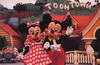 Mickey and Minnie in front of his house