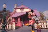Minnie in front of her house